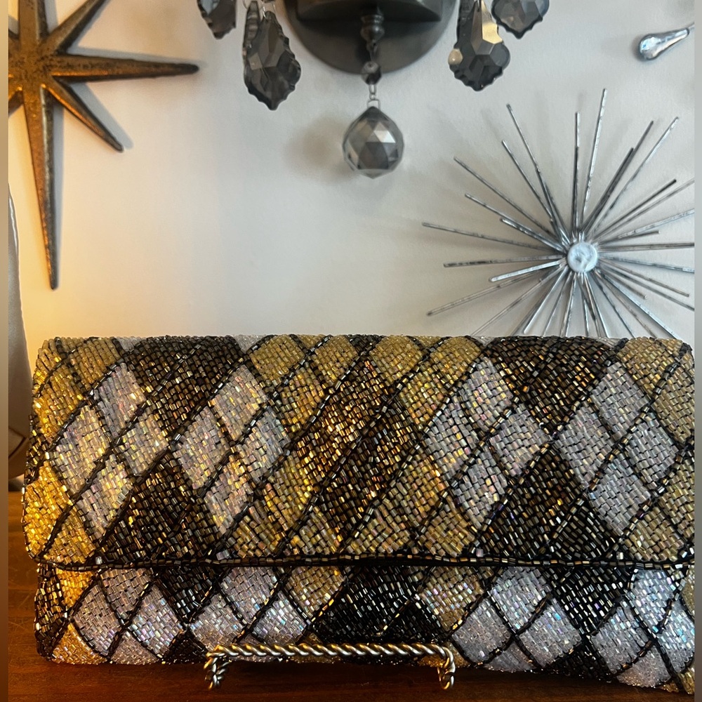 Clutch handbag with strap option